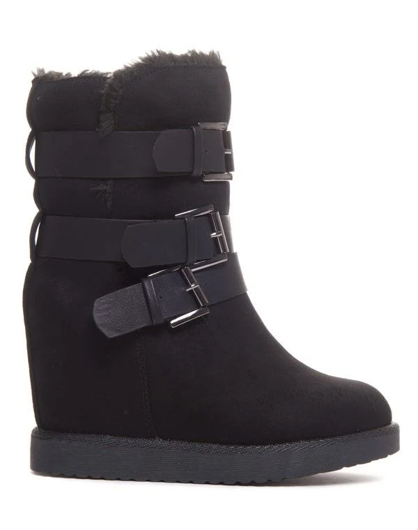 Bottines noires fourrées et compensés