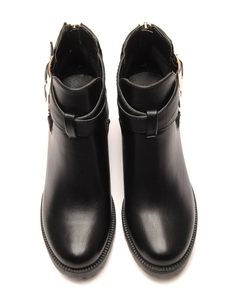 Bottines à talons noires ajourées et pailletées