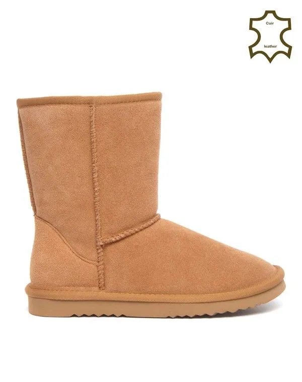 Botte fourrée en cuir camel à coutures apparentes