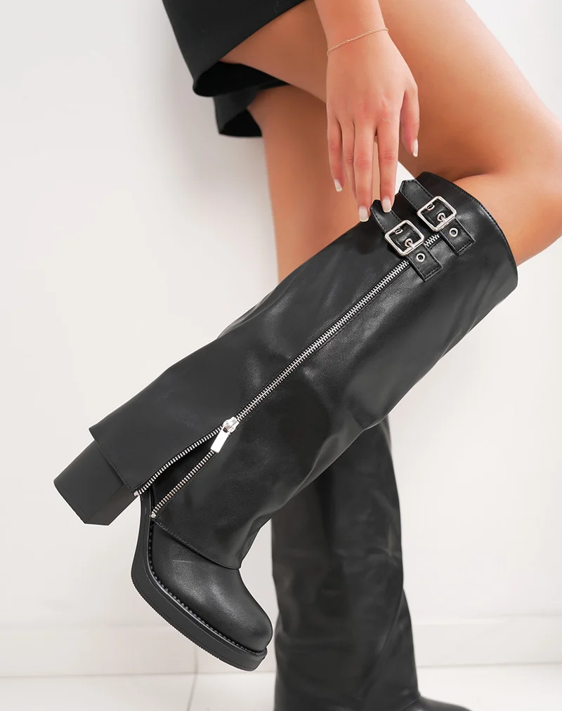 Bottes noires à revers, boucles et zip argentés