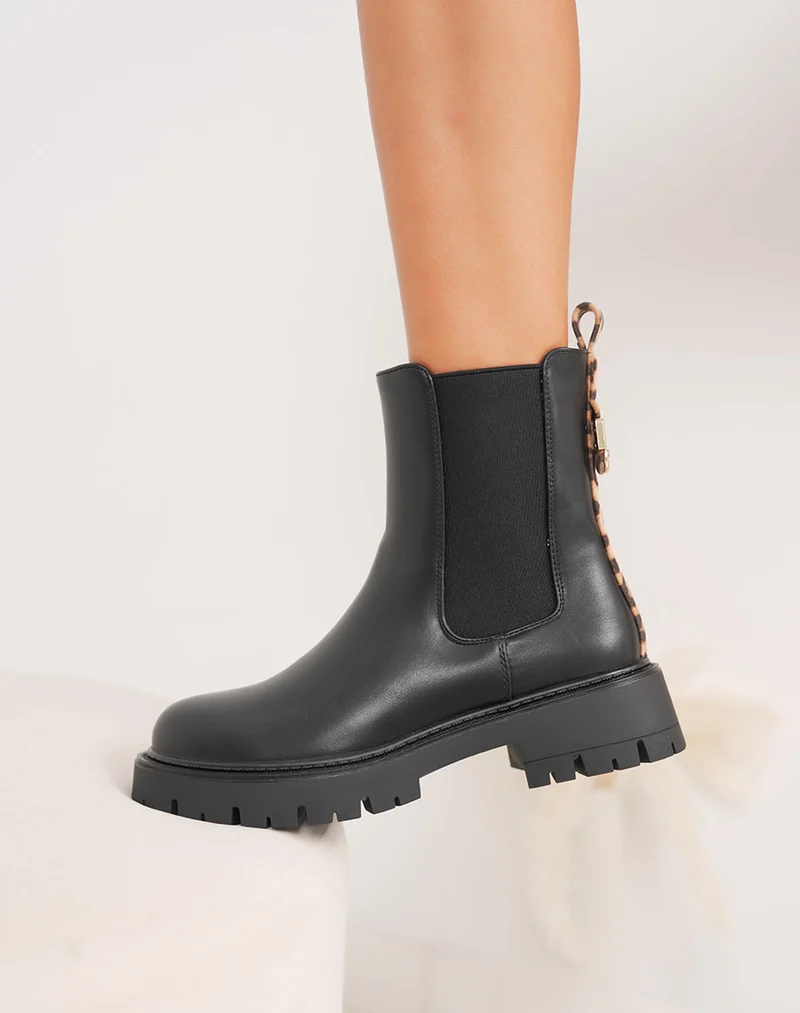 Bottines femme noires style Chelsea avec détail léopard et semelle crantée
