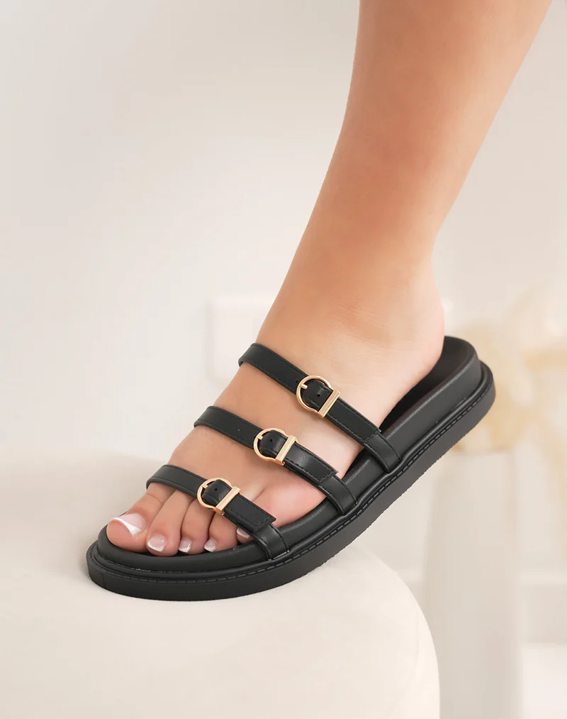 Mules femme noires à brides fines avec boucles dorées élégantes