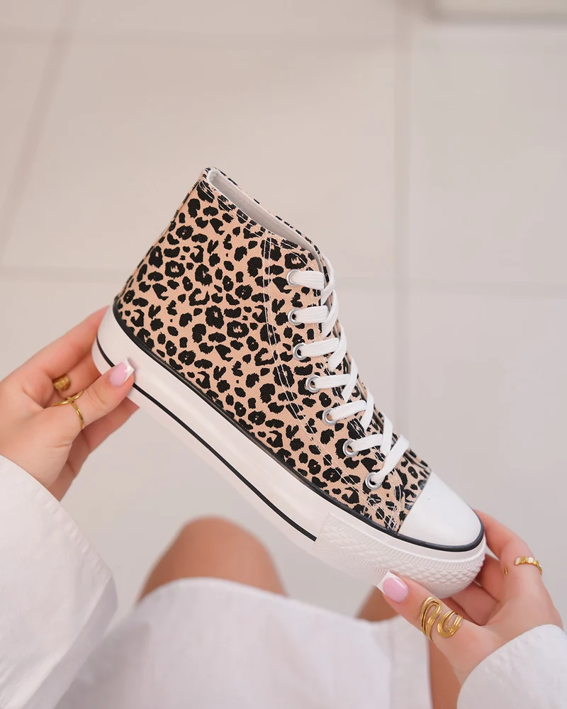 Basket femme montante léopard avec semelle blanche