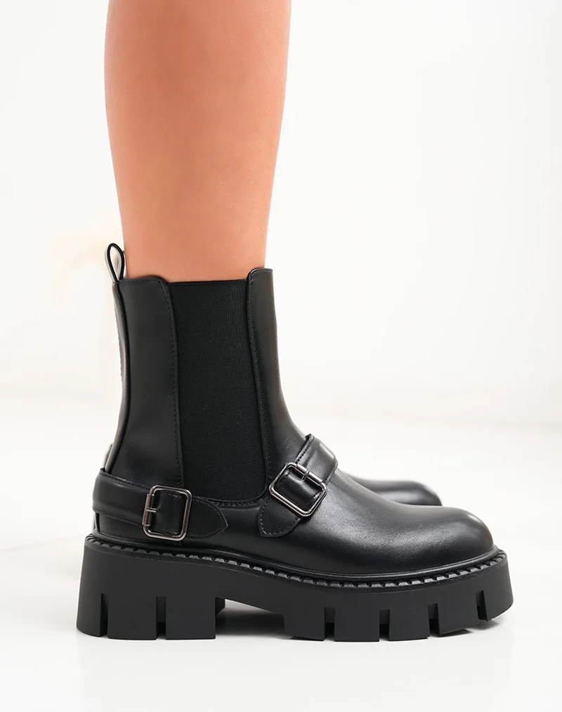 Bottines noires à semelle crantée et double boucles