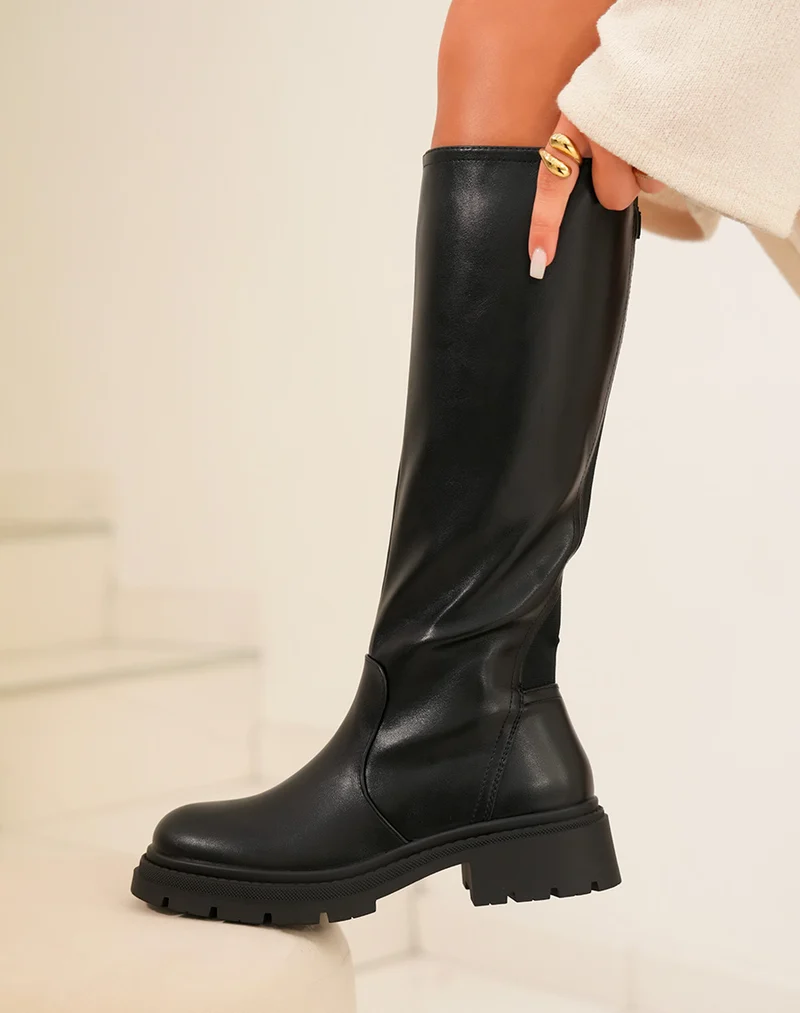Bottes femme noires hautes avec semelle crantée et fermeture éclair