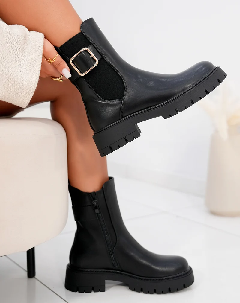 Bottines femme noires style Chelsea avec boucle dorée et semelle crantée