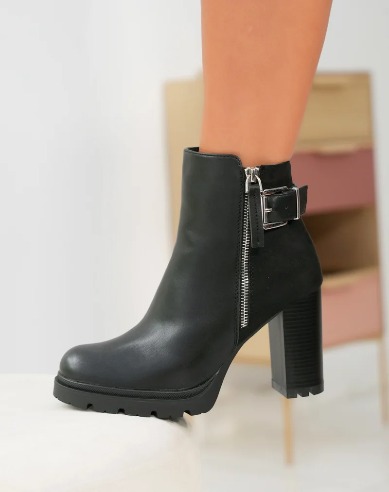 Bottines noires bi-matières à talons crantés avec sangle
