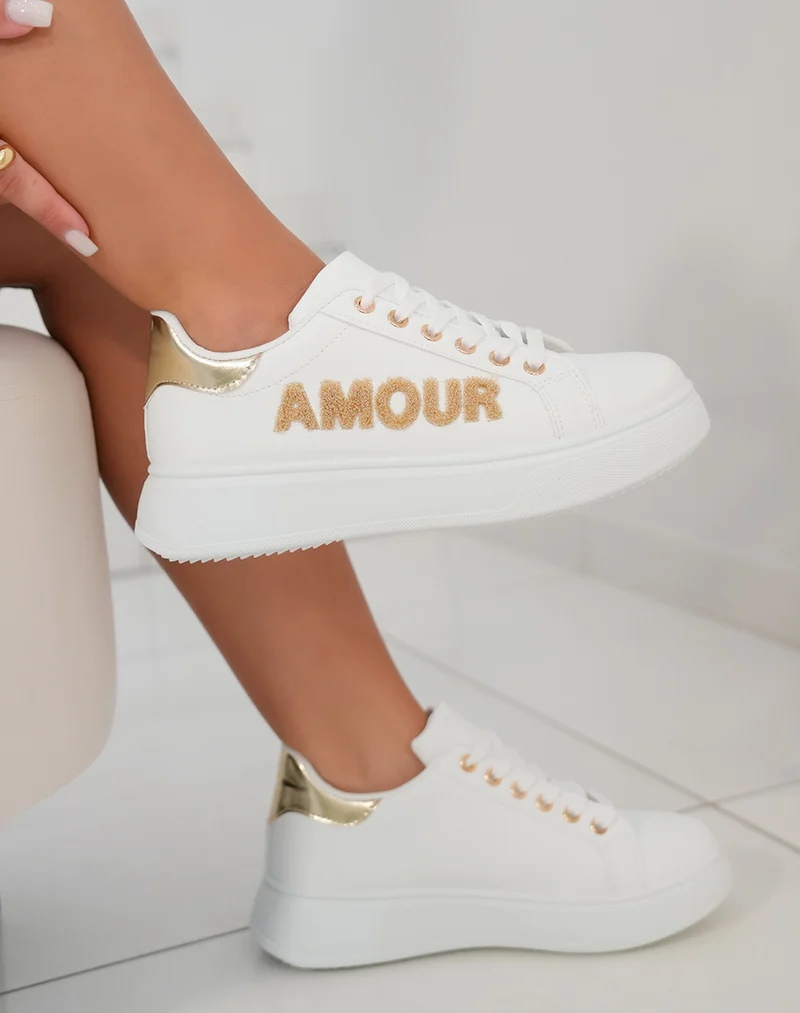 Basket femme blanche avec semelle épaisse et détails dorés