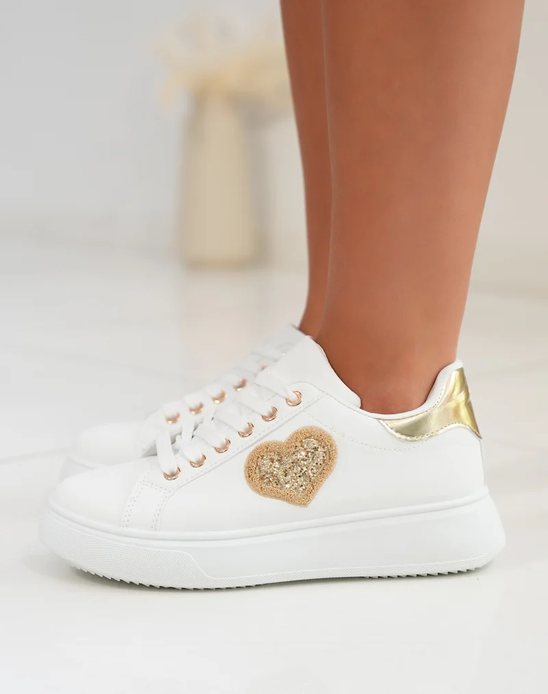 Basket femme blanche avec semelle épaisse et détails dorés