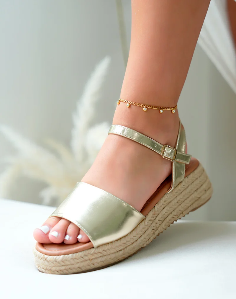 Sandales dorées à bride et à talon compensée
