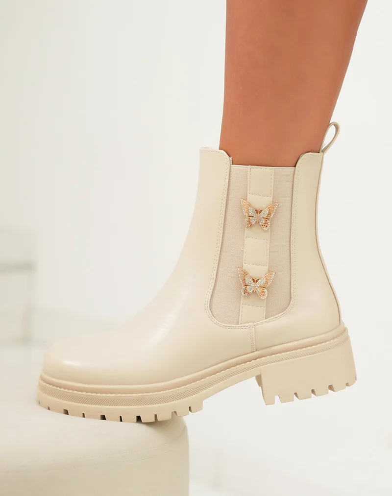 Bottines femme beige style Chelsea avec papillons dorés et semelle crantée