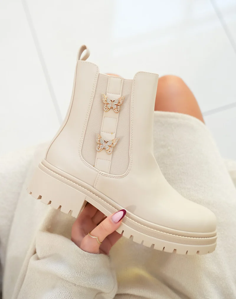 Bottines femme beige style Chelsea avec papillons dorés et semelle crantée