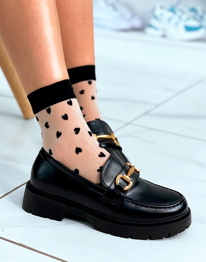 Mocassins noires à détail doré pour femme