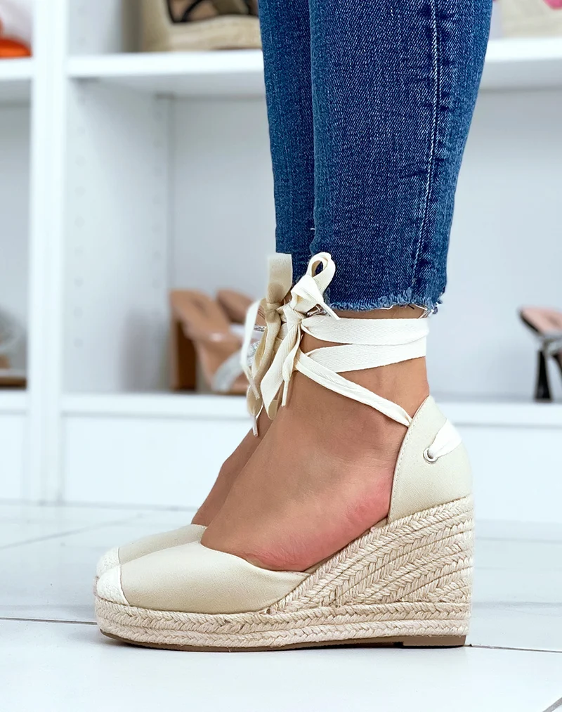 Espadrilles à talons compensés en toile beige à rubans